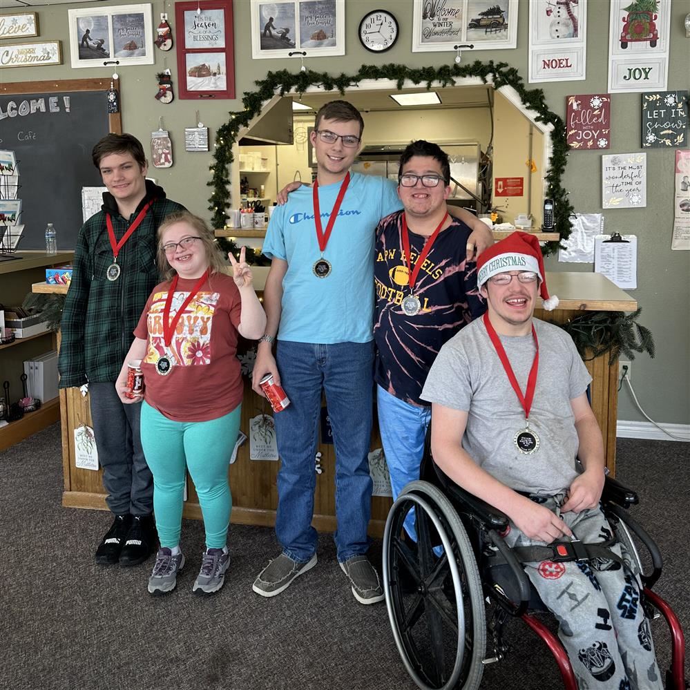  Students at Pulaski’s Make Sense Shop proudly wearing the medals they received for picking up trash